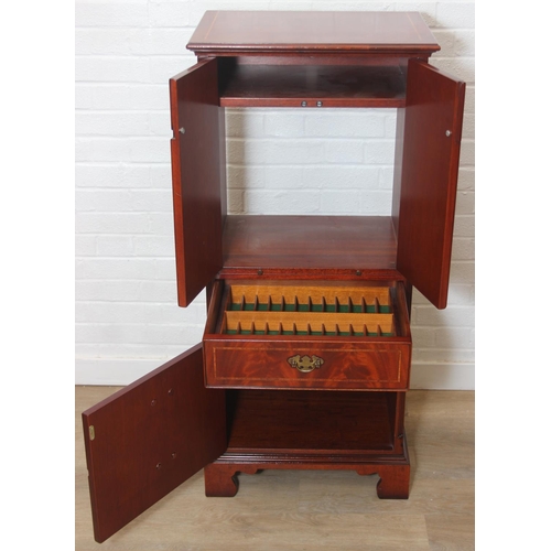 25 - A Bel Furniture Limited flame mahogany and satinwood inlaid 'chest-on-stand' music cabinet, moulded ... 