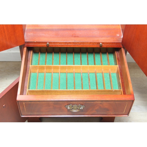 25 - A Bel Furniture Limited flame mahogany and satinwood inlaid 'chest-on-stand' music cabinet, moulded ... 