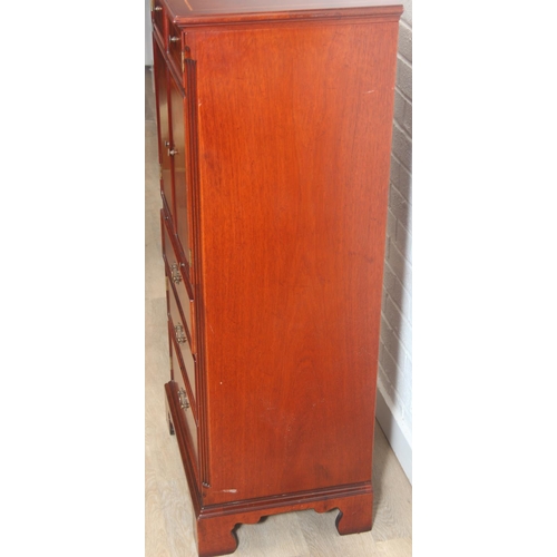25 - A Bel Furniture Limited flame mahogany and satinwood inlaid 'chest-on-stand' music cabinet, moulded ... 