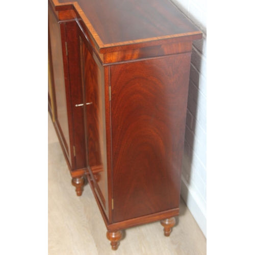20 - William Tillman Furniture - a Regency style flame Mahogany sideboard, four doors with the central pa... 
