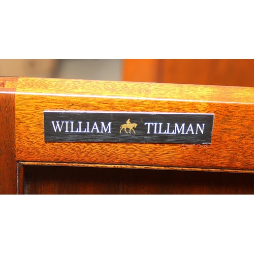 20 - William Tillman Furniture - a Regency style flame Mahogany sideboard, four doors with the central pa... 