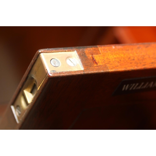 20 - William Tillman Furniture - a Regency style flame Mahogany sideboard, four doors with the central pa... 