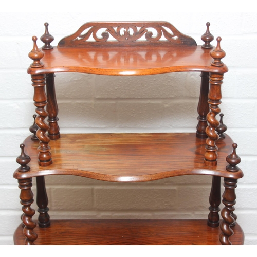 26 - An antique whatnot with six oak tiers and turned rosewood barleytwist supports, 70cm x 27cm x 135cm