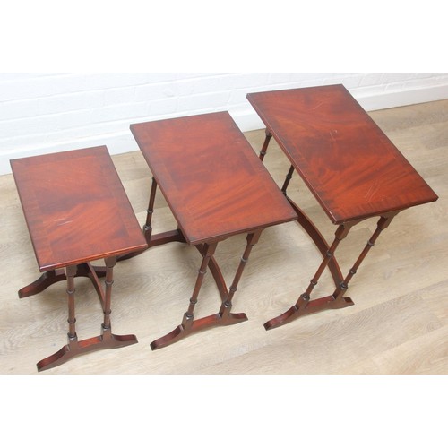 29 - A high quality modern mahogany nest of three tables by Bright's of Nettlebed, the largest 48cm x 33c... 