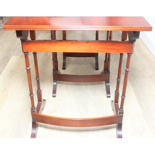 29 - A high quality modern mahogany nest of three tables by Bright's of Nettlebed, the largest 48cm x 33c... 