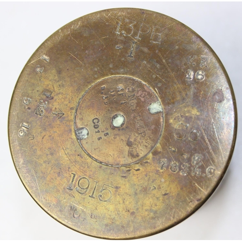A 1915 dated 13 pounder trench art shell case, cut design with handles ...
