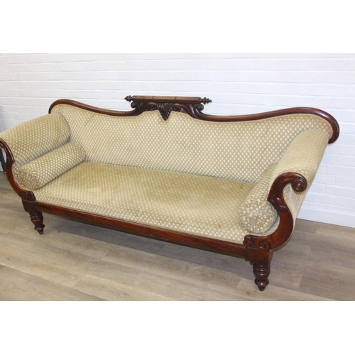 68 - A Victorian roll end sofa or settee with exposed mahogany frame, buff upholstery, 224cm long x 94cm ...