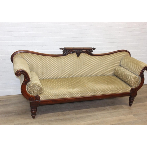 68 - A Victorian roll end sofa or settee with exposed mahogany frame, buff upholstery, 224cm long x 94cm ...