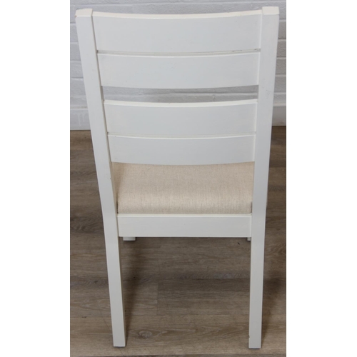 76 - Modern white painted extending dining table with oak top and four matching chairs, the table 68cm x ...