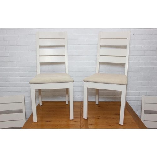 76 - Modern white painted extending dining table with oak top and four matching chairs, the table 68cm x ...