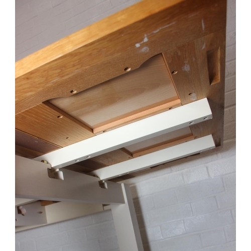 76 - Modern white painted extending dining table with oak top and four matching chairs, the table 68cm x ...