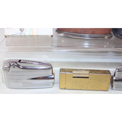 1557 - Qty of assorted smoking related items to inc Bakelite ashtrays, lighters advertising items etc