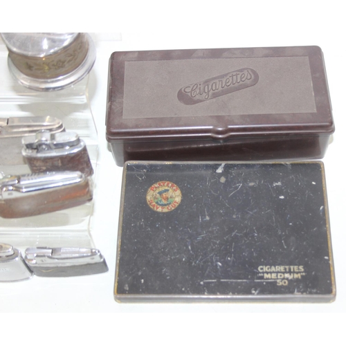 1557 - Qty of assorted smoking related items to inc Bakelite ashtrays, lighters advertising items etc