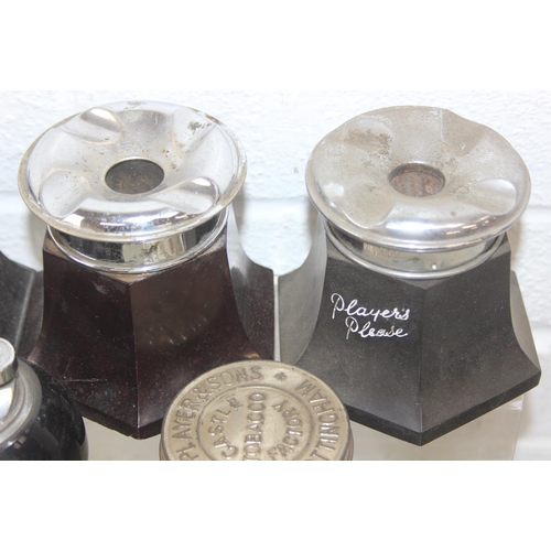 1557 - Qty of assorted smoking related items to inc Bakelite ashtrays, lighters advertising items etc