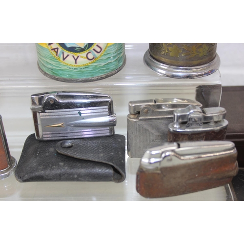 1557 - Qty of assorted smoking related items to inc Bakelite ashtrays, lighters advertising items etc