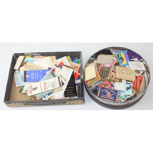 528A - Advertising - Phillumeny - two vintage tins containing antique and later matchbox advertising covers... 