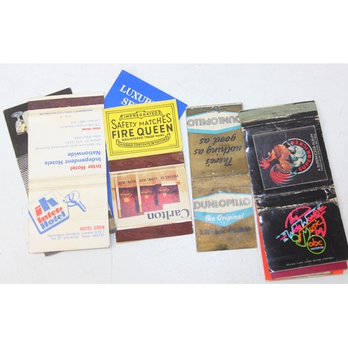 528A - Advertising - Phillumeny - two vintage tins containing antique and later matchbox advertising covers... 