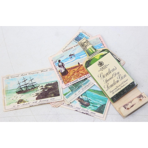 528A - Advertising - Phillumeny - two vintage tins containing antique and later matchbox advertising covers... 