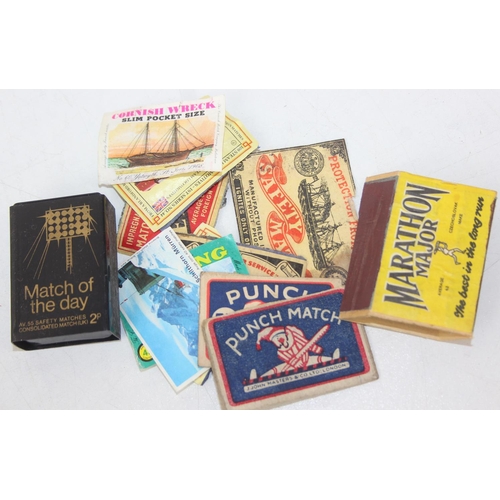 528A - Advertising - Phillumeny - two vintage tins containing antique and later matchbox advertising covers... 