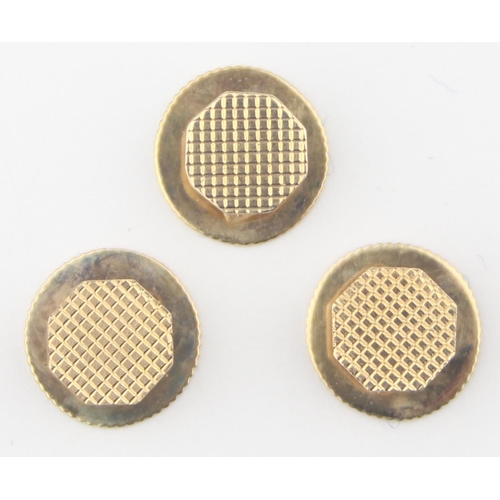 1125 - [3.07g] - a boxed set of three 9ct gold shirt studs of octagonal form with engine turning, marked fo... 