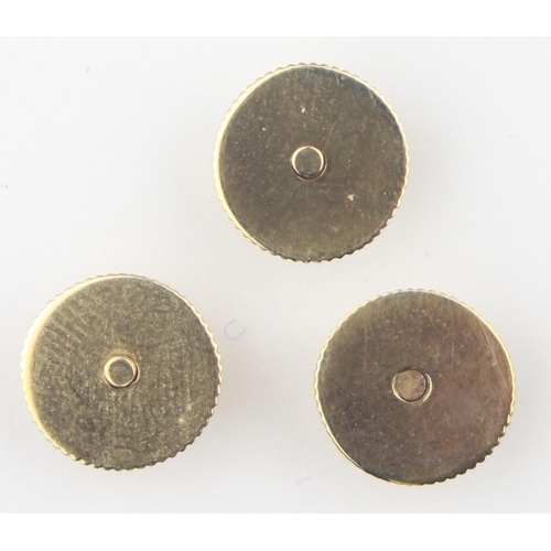 1125 - [3.07g] - a boxed set of three 9ct gold shirt studs of octagonal form with engine turning, marked fo... 