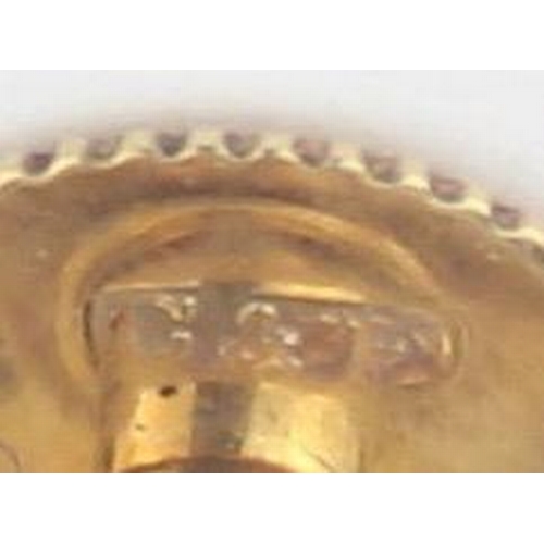 1125 - [3.07g] - a boxed set of three 9ct gold shirt studs of octagonal form with engine turning, marked fo... 