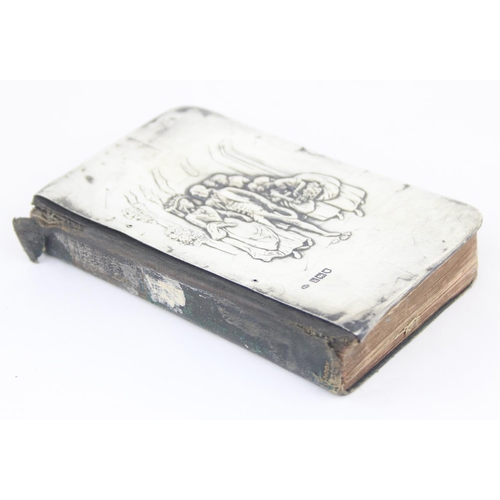 1011C - An Edwardian silver mounted prayer book with embossed wedding scene, London 1905 by William Comyns, ... 
