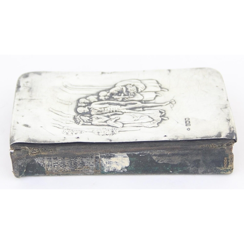 1011C - An Edwardian silver mounted prayer book with embossed wedding scene, London 1905 by William Comyns, ... 
