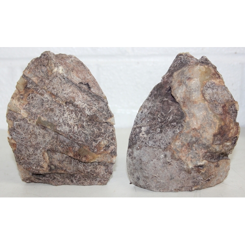 A pair of stone geode bookends, a white alabaster cigar box, a slice of ...