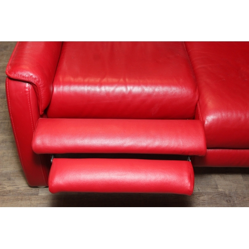 14 - Iolino of Italy - a retro style red leather three seater sofa with three reclining seats, 195cm wide... 