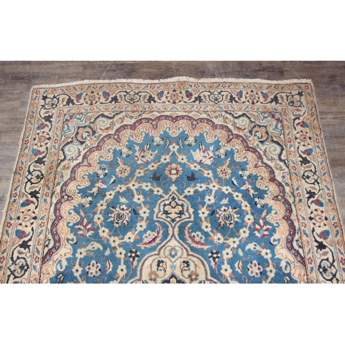 254 - A vintage high quality rug with blue medallion to centre, possibly Turkish, 208cm x 123cm