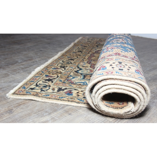 254 - A vintage high quality rug with blue medallion to centre, possibly Turkish, 208cm x 123cm