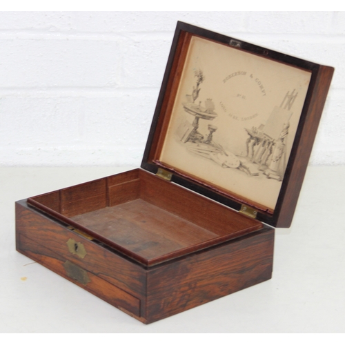 236 - An antique rosewood artists box, lacking interior but lid advertising for Robertson & Company of Lon... 