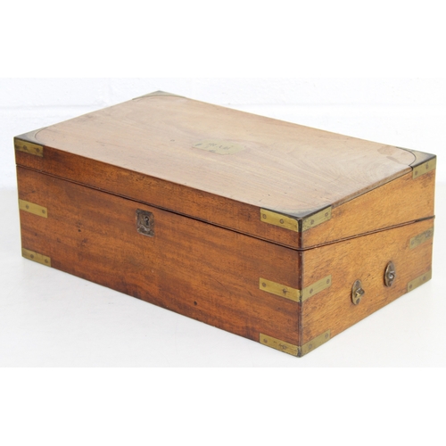 238 - Campaign style mahogany writing slope with brass corners and banding, key and brass topped travel in... 