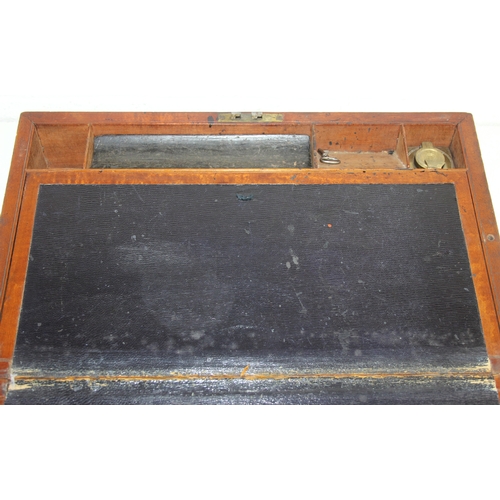 238 - Campaign style mahogany writing slope with brass corners and banding, key and brass topped travel in... 