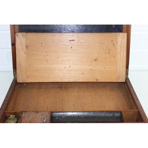 238 - Campaign style mahogany writing slope with brass corners and banding, key and brass topped travel in... 