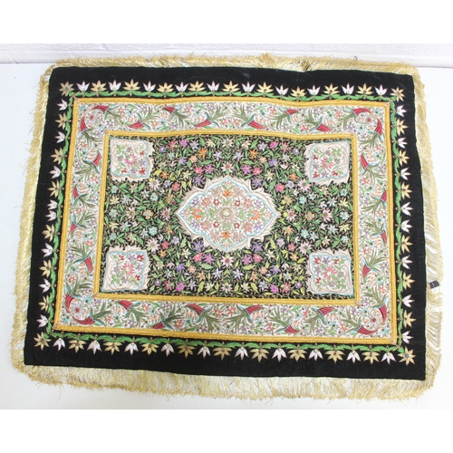 241 - An Indian Zardozi wall hanging with black ground, gilt embroidery and cabochon stones, 64cm x 54cm