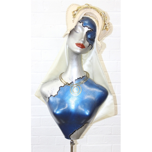 239D - An Art Deco style painted mannequin on adjustable stand, with head dress