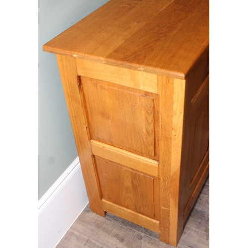 14 - A modern light oak three drawer two door sideboard made by Neil Thompson, 156cm x 55cm x 101cm