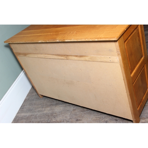 14 - A modern light oak three drawer two door sideboard made by Neil Thompson, 156cm x 55cm x 101cm