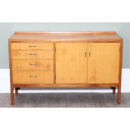 15 - A retro Remploy sideboard with two door cupboard and four drawers, dated 1968 to reverse, 138cm x 46... 