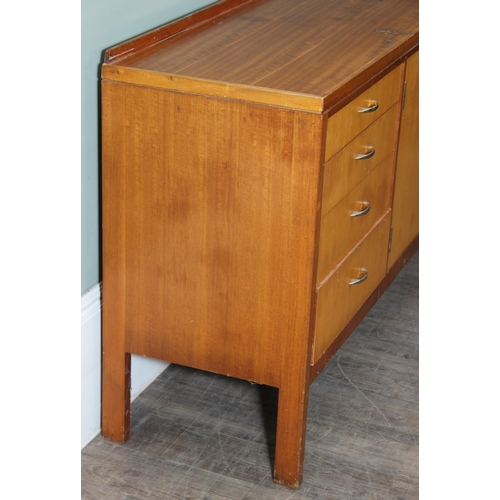 15 - A retro Remploy sideboard with two door cupboard and four drawers, dated 1968 to reverse, 138cm x 46... 