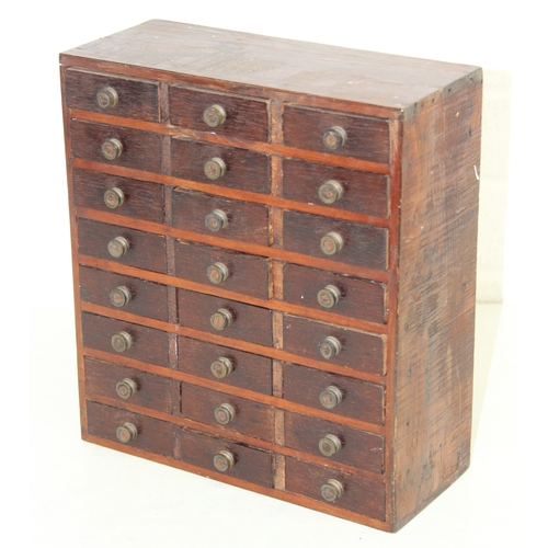A small vintage multi-drawer engineers or collectors cabinet comprising ...