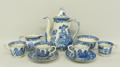 A Royal Worcester pottery part coffee service decorated in the 'Crown Willow' pattern, printed mark,... 