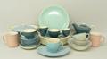 A Poole pottery mixed twin tone tea service including teapot, cups and saucers, and pale blue Wedgwo... 