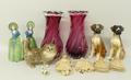 A quantity of ceramics including a Beswick Persian cat, pair of bookends modelled as 18th century gi... 