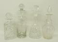 A group of cut glass decanters, one etched with Royal Air Force station Laabruel, one of smaller slo... 