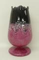 A Vasart, Perth, glass tulip lamp with millefiore inclusions againt a pink and black ground, 28cm hi... 