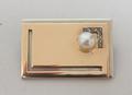 An Austrian two colour gold brooch, A Kochert, Vienna, set to one corner with nine old cut diamonds ... 