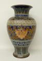 A Doulton Lambeth stoneware vase of baluster form, by Frank Butler, sgrafitto decorated with leaves,... 